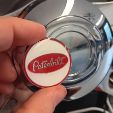 peterbilt-steering-wheel-horn-button peterbilt-steering-wheel-horn-button-metal-emblem-3m-red-white-1.5-inches